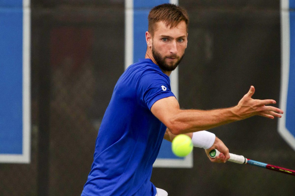 Senior Joshua Lapadat looks to hit the ball at the Hillary J. Boone Tennis Facility on Friday, May 3, 2024, in Lexington, Kentucky. He wins his sets 6-3 and 6-1 respectively.