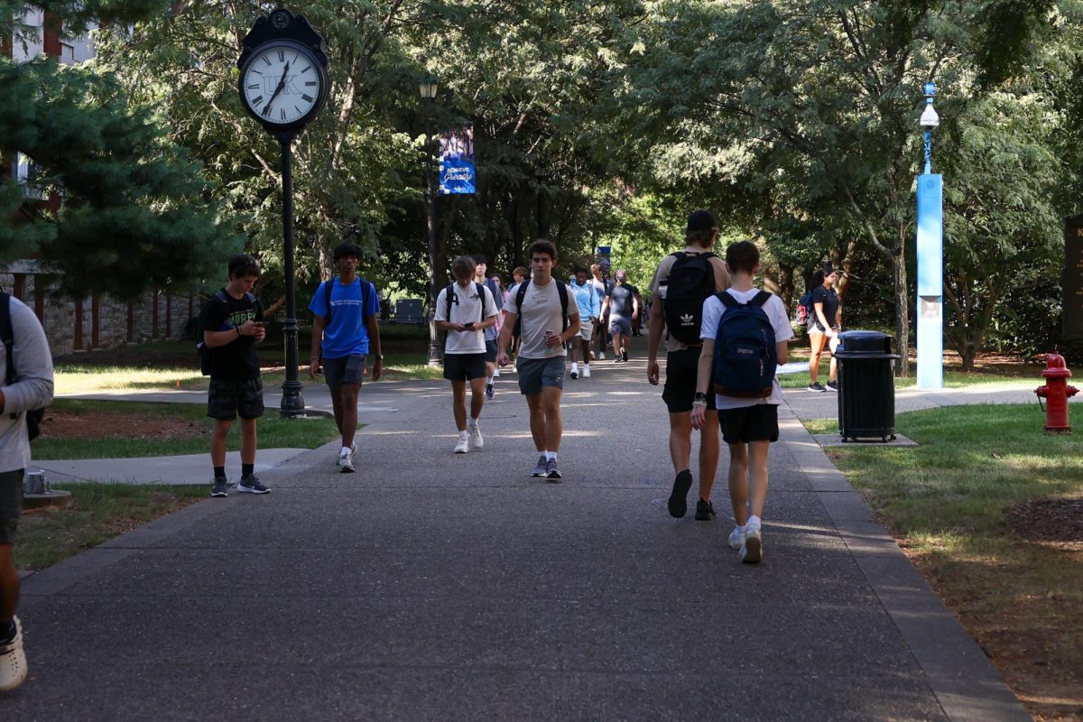 Kentucky students walk between Grehan Building and Pence Hall during the first day of classes on Monday, Aug. 26, 2024, in Lexington, Kentucky. Photo by Sydney Yonker |Staff