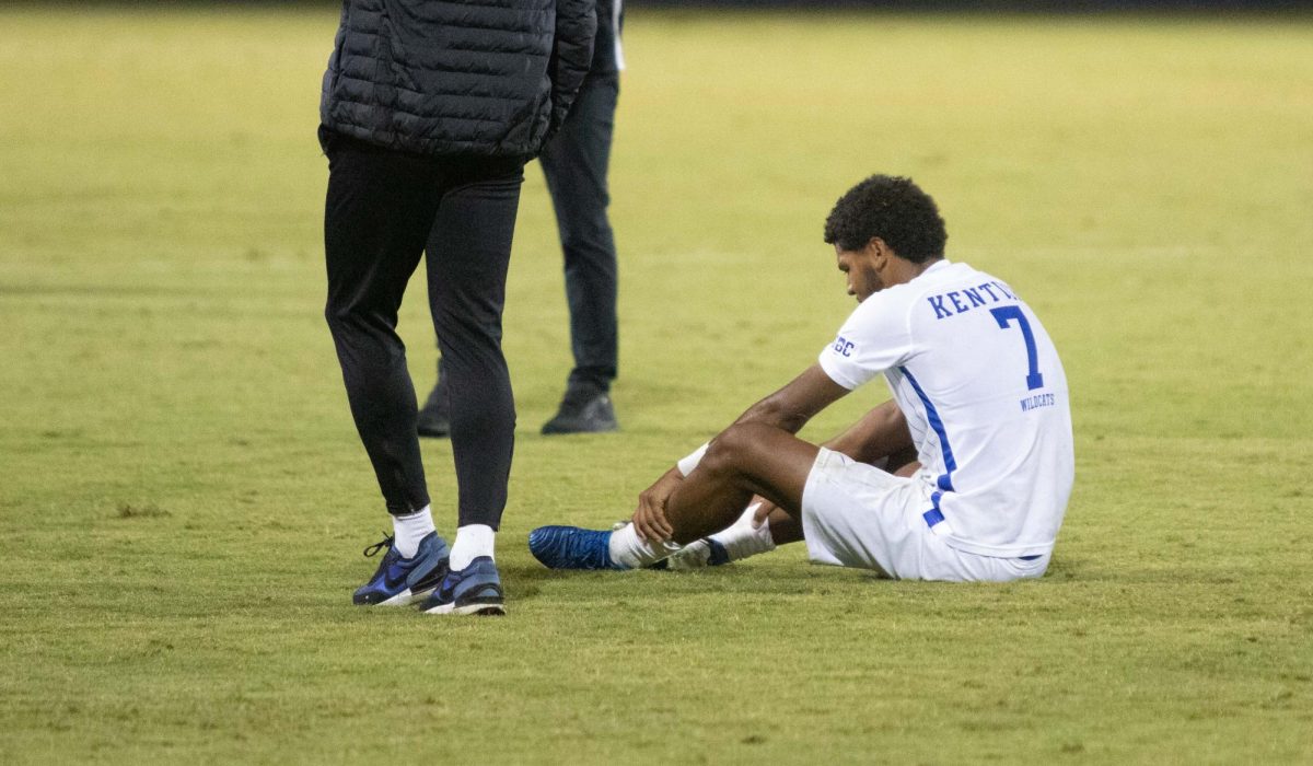 Forward, Eric Onos watches as Louisville players celebrate their win over Kentucky on Monday, Sept. 9, 2024, at the Wendell and Vickie Bell Soccer Complex in Lexington, Kentucky. Kentucky lost 1-0. Photo by Christian Kantosky | Staff