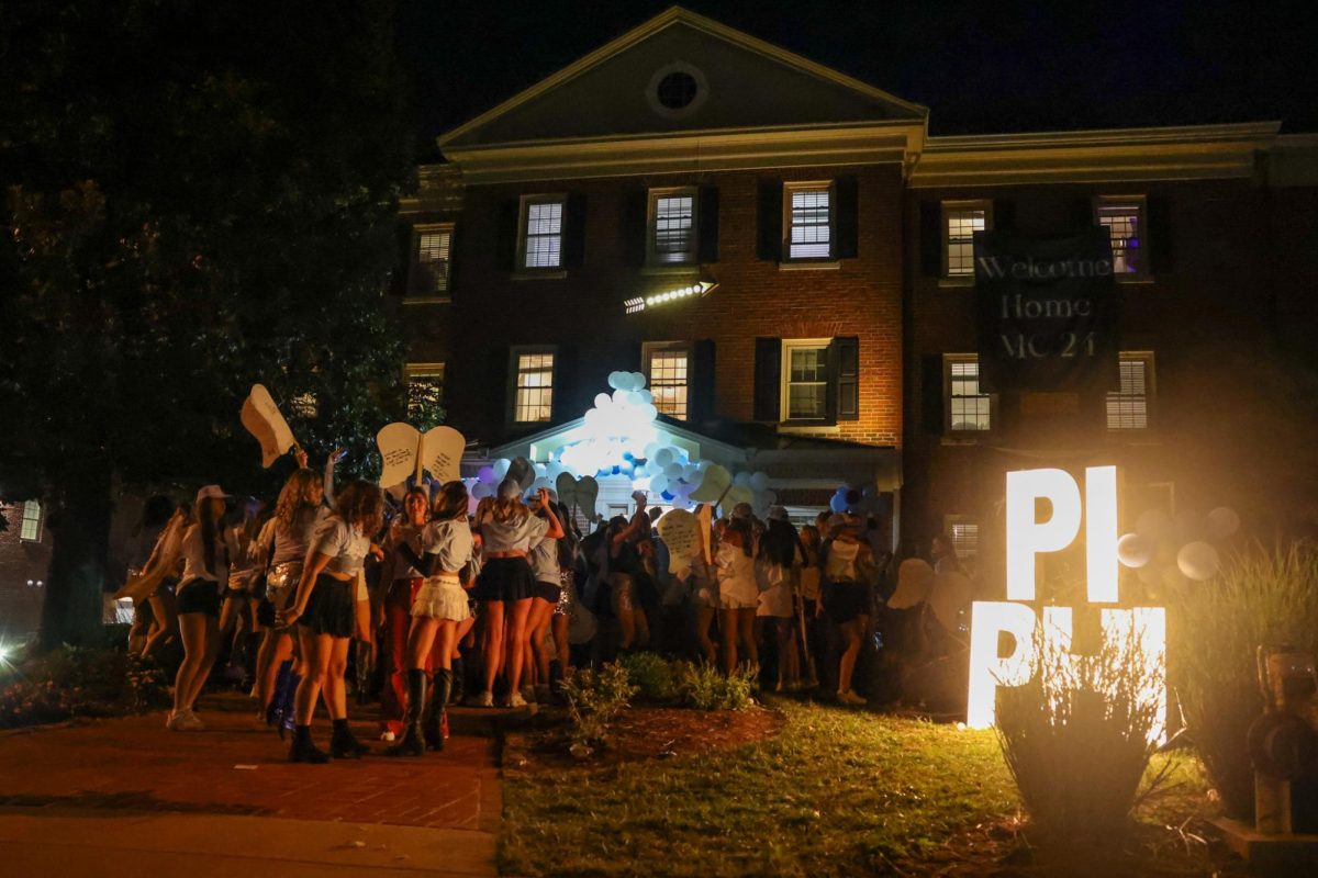 Members of Pi Phi celebrate their new members during the Kentucky sorority Bid Day on Monday, Sept. 9, 2024, at Greek Row in Lexington, Kentucky. Photos by | Sydney Yonker | Staff