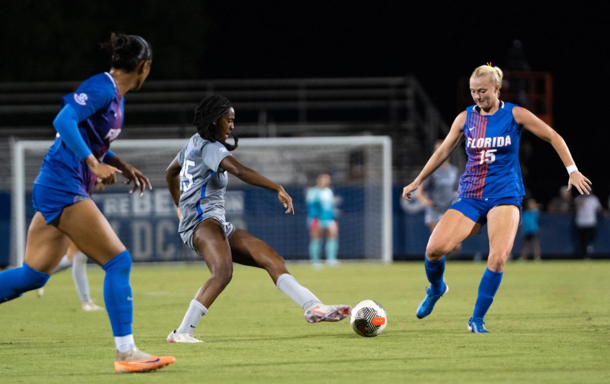 Kentucky forward Makala Woods goes for the ball against a defender in the Kentucky Women’s Soccer Game vs. Florida on Thursday, Sept. 19, 2024, at the Wendell and Vickie Bell Soccer Complex in Lexington, Kentucky. The teams tied 0-0. Photo by Brayden Finn | Staff