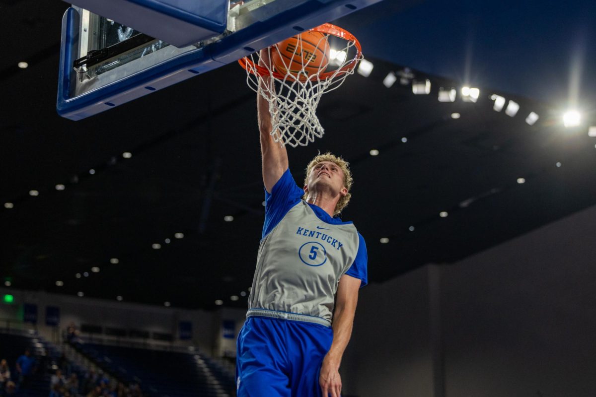 Kentucky guard Collin Chandler (5) dunks the ball during the Kentucky Blue-White Preseason Event on Friday, Oct. 18, 2024, at Historic Memorial Coliseum in Lexington, Kentucky. Photo by Sydney Yonker | Staff