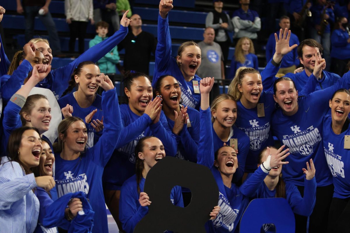 Kentucky Wildcats Celebrate after winning their 8th SEC Title in a row following the volleyball match vs. Arkansas on Sunday, Nov. 24, 2024, at Historic Memorial Coliseum in Lexington, Kentucky. Kentucky won 3-0. Photo by Robby Robinson. | Staff 