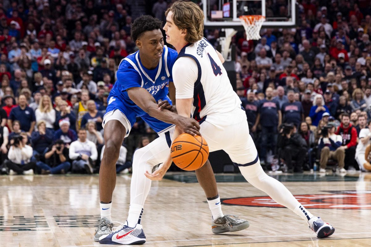 Kentucky Wildcats guard Jaxson Robinson (2) pokes the ball free from Gonzaga Bulldogs guard Dusty Stromer (4)during the basketball game vs. Gonzaga on Sunday, Dec. 8, 2024, at Climate Pledge Arena in Seattle, Washington.  Kentucky won 90-89. Photo by Matthew Mueller | Photo Editor