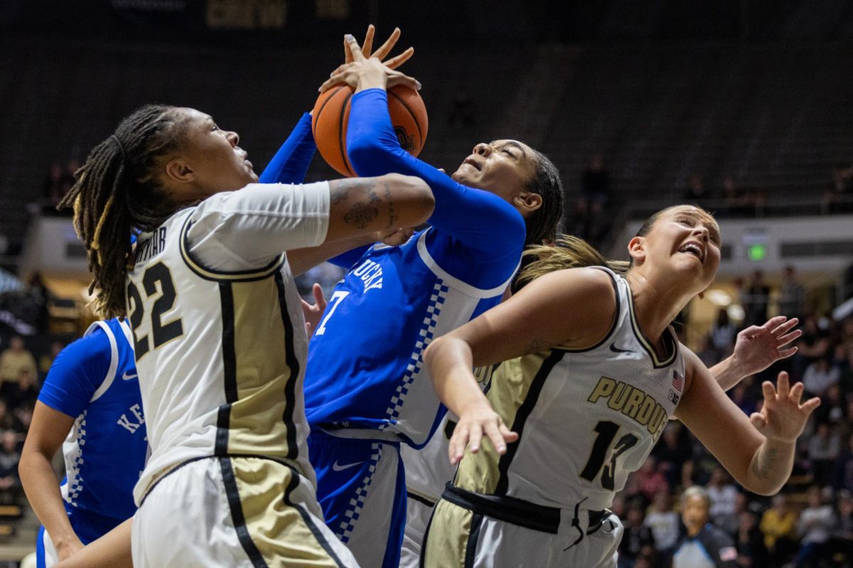 Kentucky Wildcats forward Teonni Key (7) fights for a rebound during the Kentucky vs Purdue women’s basketball on Saturday, Dec. 14, 2024, at Mackey Arena in West Lafayette, Indiana. Kentucky won 82-52. Photo by Sydney Yonker | Staff