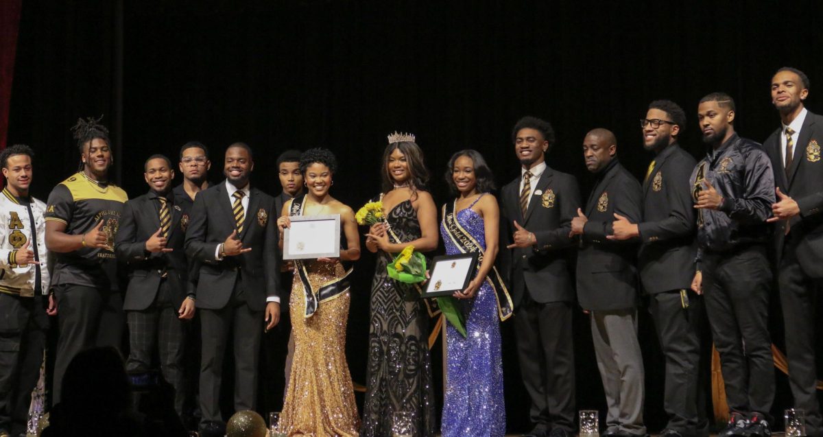 Alpha Phi Alpha Members with this year's Miss Black and Gold, Miss Gold, and Miss Epsilon Chi during the Miss Black and Gold Scholarship Pageant on Dec. 4, 2024 at the Lyric Theatre and Cultural Arts Center. Photo by Hannah Piedad | Staff