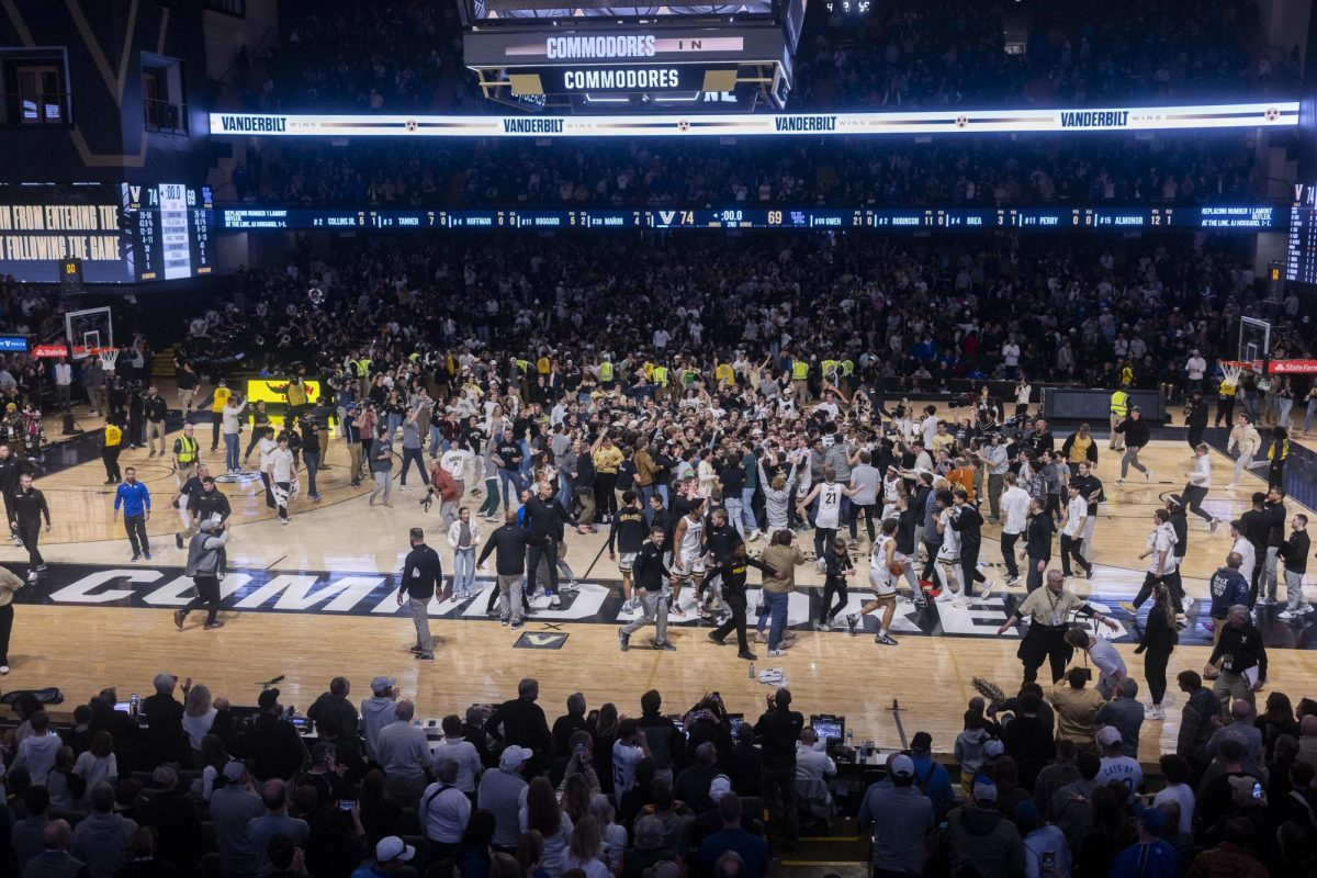 Vanderbilt Commodores fans rush the court after they defeated Kentucky during the basketball game vs. Vanderbilt on Saturday, Jan. 25, 2025, at Memorial Gymnasium in Nashville, Tennessee. Kentucky lost 74-69. Photo by Matthew Mueller | Photo Editor