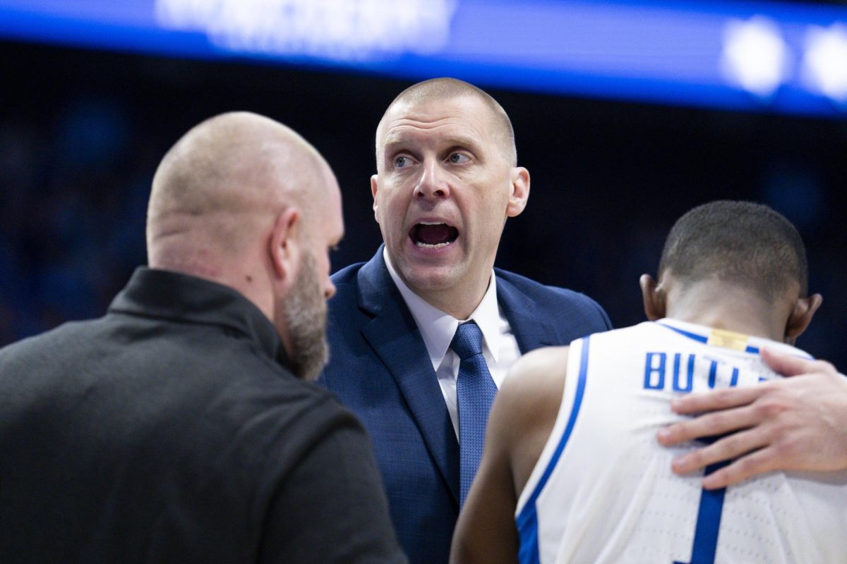 Kentucky Wildcats head coach Mark Pope consoles Kentucky Wildcats guard Lamont Butler (1) after he is kicked in the face during the basketball game vs. Texas A&M on Tuesday, Jan. 14, 2025, Rupp Arena in Lexington, Kentucky. Kentucky won 81-69. Photo by Christian Kantosky | Assistant Photo Editor