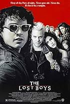 Jami Gertz, Corey Haim, Jason Patric, Kiefer Sutherland, Brooke McCarter, Alex Winter, and Billy Wirth in The Lost Boys (1987)