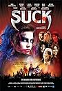 Malcolm McDowell, Alice Cooper, Dave Foley, Moby, Iggy Pop, Alex Lifeson, Jessica Paré, Henry Rollins, Rob Stefaniuk, Mike Lobel, Paul Anthony, Dimitri Coats, and Chris Ratz in Suck (2009)