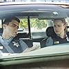 Josh Segarra and Jessica McNamee in Sirens (2014)