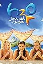 Indiana Evans, Phoebe Tonkin, and Cariba Heine in H2O: Just Add Water (2006)