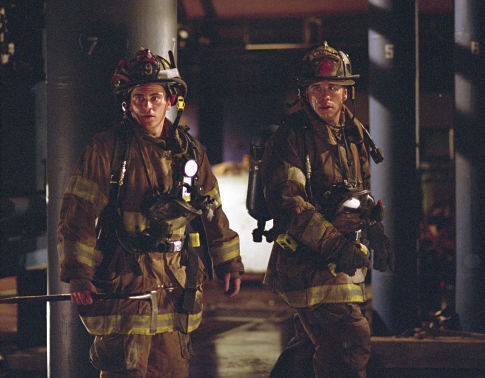 John Travolta and Joaquin Phoenix in Ladder 49 (2004)