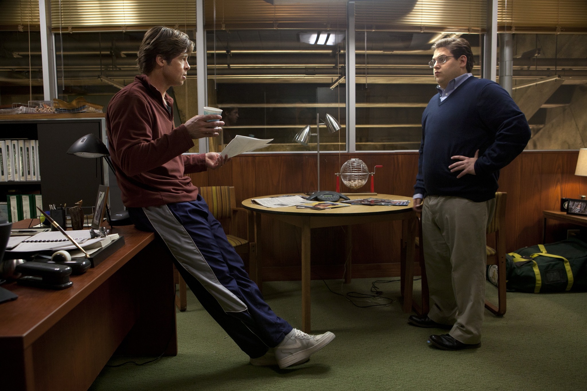 Brad Pitt and Jonah Hill in Moneyball (2011)