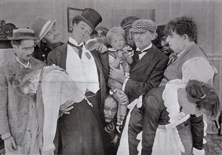 Romaine Fielding, Edward Sedgwick, Eileen Sedgwick, and James Ardis in The Kid's Nap (1914)