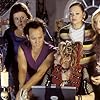 After waking up in the body of a 30-year-old man, Jessica (Rob Schneider, center left) and friends Keecia (Maritza Murray, far left), Hildenburg (Megan Kuhlmann, medium left), Lulu (Alexandra Holden, medium right), and April (Anna Faris, far right) try to figure out how to change him back into a woman with help from the high school witch, Eden (Sam Doumit, front center, right). 