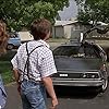 Michael J. Fox, Christopher Lloyd, and Claudia Wells in Back to the Future (1985)