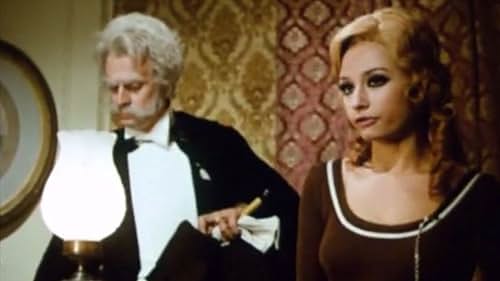 Raffaella Carrà and Georges Descrières in Arsène Lupin (1971)