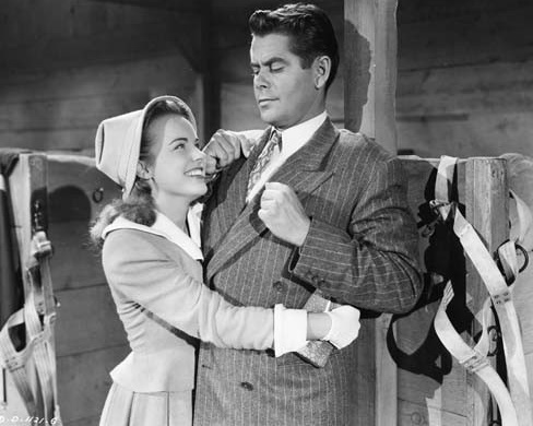 Glenn Ford and Terry Moore in The Return of October (1948)