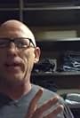 Scott Adams in Scott Adams Solves the Sanctuary City Standoff While Folding Laundry (2018)