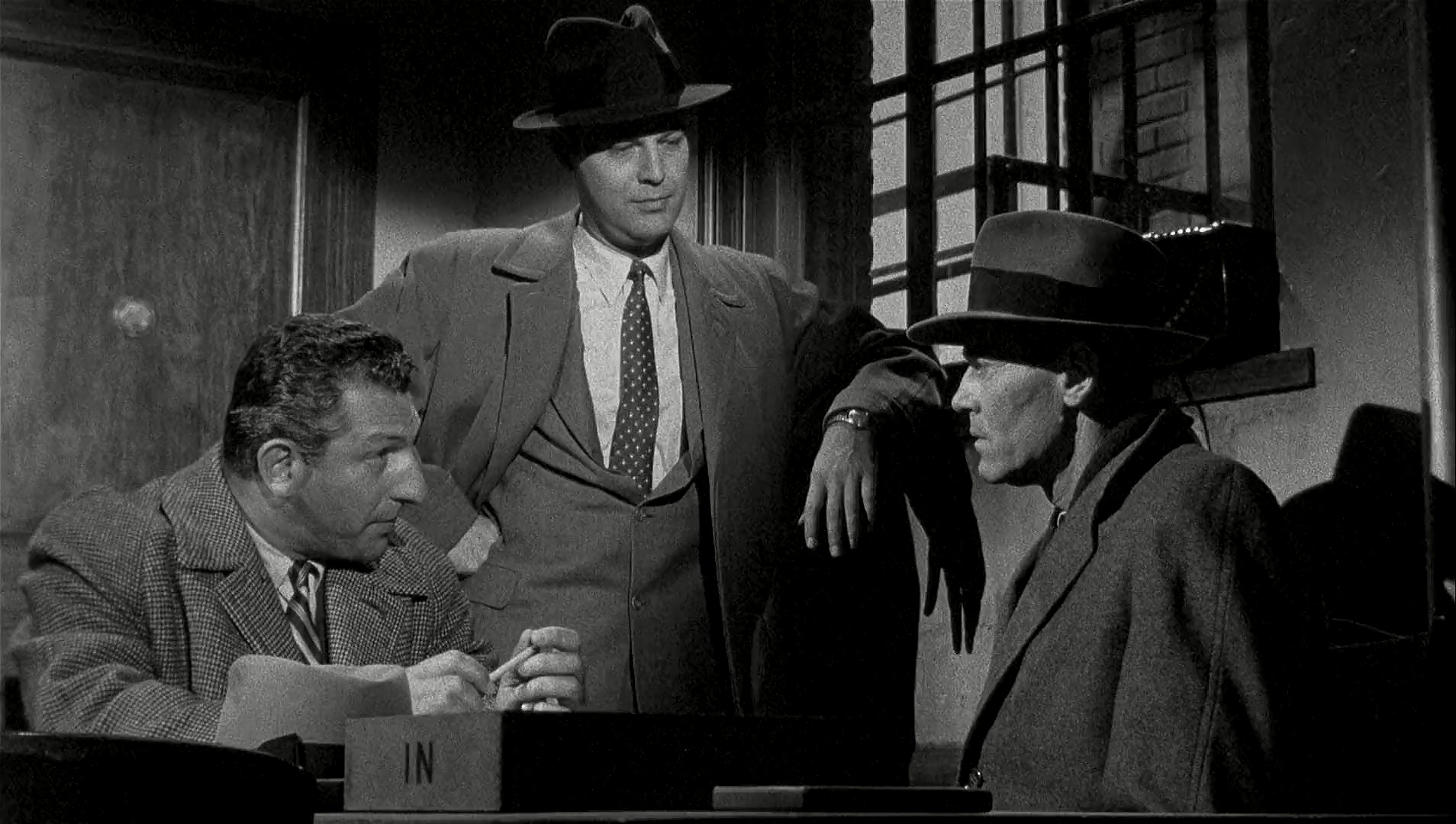 Henry Fonda, Charles Cooper, and Harold J. Stone in The Wrong Man (1956)