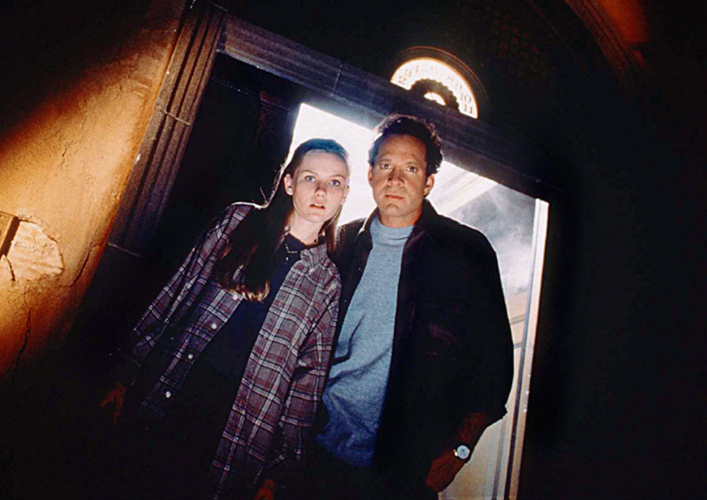 Kirsten Dunst and Steve Guttenberg in Tower of Terror (1997)