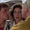 Michael J. Fox, Christopher Lloyd, and Claudia Wells in Back to the Future (1985)