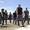 Vin Diesel, Sung Kang, Tyrese Gibson, Paul Walker, Tego Calderon, Don Omar, and Gal Gadot in Fast Five (2011)