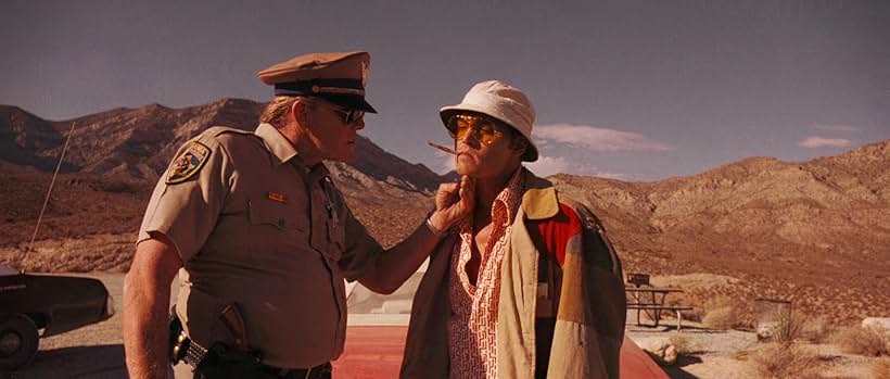 Johnny Depp and Gary Busey in Fear and Loathing in Las Vegas (1998)