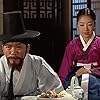 Lee Hie-do and Hong Ri-na in Dae Jang-geum (2003)