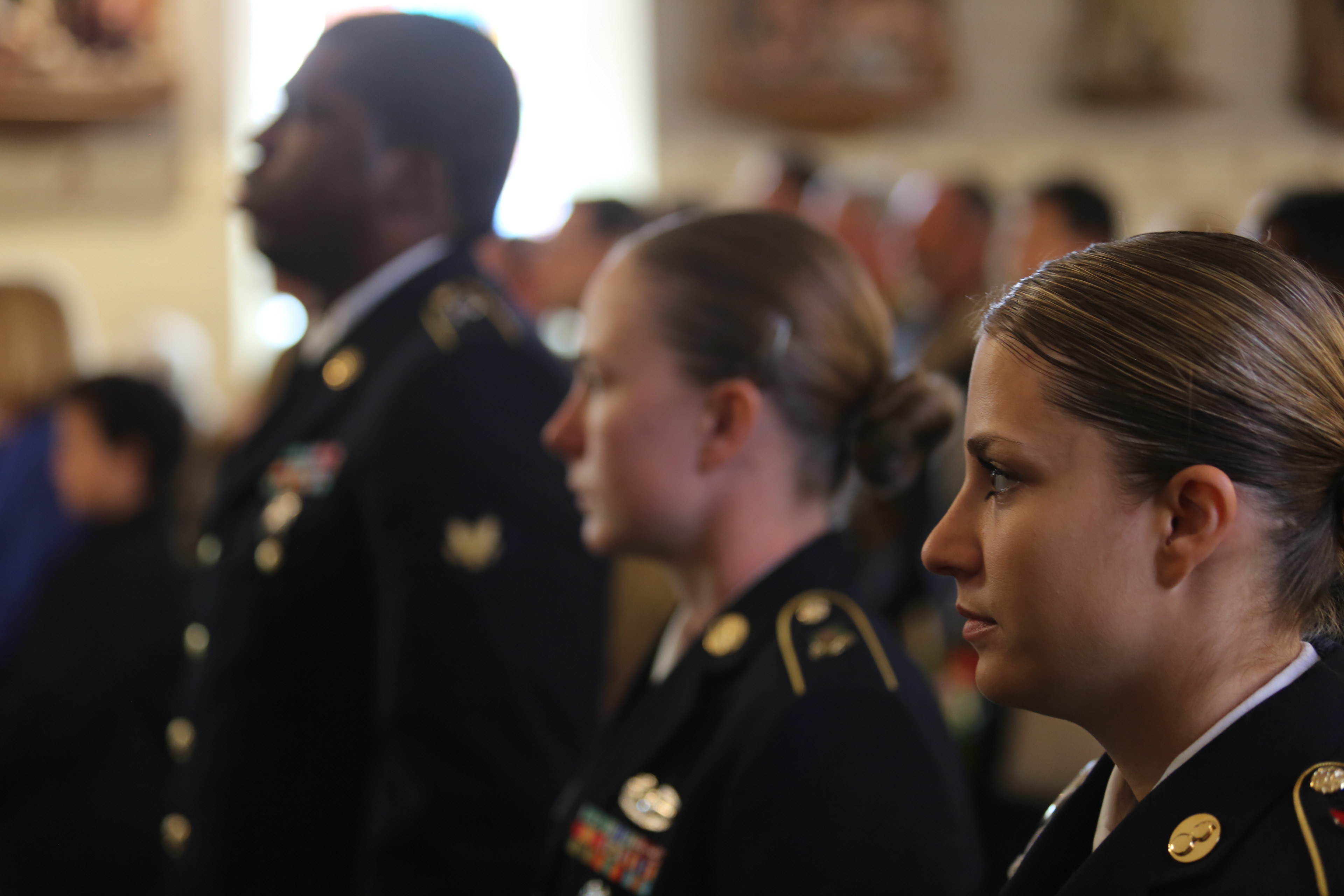 Army stand attention listening to historic ceremony