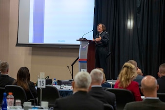 LEESBURG, Va. (Oct. 03, 2023) - Vice Chief of Naval Operations (VCNO) Adm. Lisa Franchetti speaks to the U.S. Marine Corps’ (USMC) senior officers at the USMC Executive & General Officer Offsite Symposium in Leesburg, Va., Oct. 3. During her remarks, Franchetti discussed her vision for continued integration for the U.S. Navy and USMC team. (U.S. Navy photo by Chief Mass Communication Specialist Amanda R. Gray/Released)