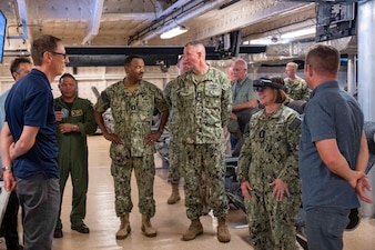 KEY WEST, Fla. (Oct. 11, 2023) – Vice Chief of Naval Operations Adm. Lisa Franchetti receives a platform familiarization tour during the Navy’s Hybrid Fleet event held at Naval Station Key West, Oct. 11. The event aims to test various unmanned aerial and surface systems in order to strengthen and increase warfighter capabilities. Earlier this year, U.S. 4th Fleet was selected to operationalize 5th Fleet’s innovative use of cutting-edge technology as part of a continuous campaign of learning. (U.S. Navy photo by Chief Mass Communication Specialist Amanda R. Gray)