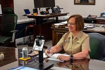 Vice Chief of Naval Operations Adm. Lisa Franchetti speaks virtually at the Surface Warfare Flag Officer Training Symposium, Sept. 13. The symposium provides flag officers from the surface community a venue to discuss the Navy’s roles, responsibilities, and future needs. (U.S. Navy photo by Chief Mass Communication Specialist Amanda Gray/released)