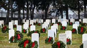 Wreaths lay on headstones