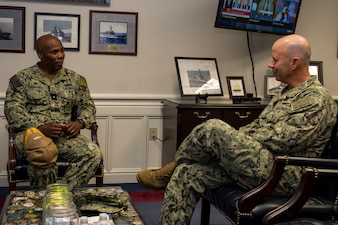 240130-N-TT671-1020 MILLINGTON, Tenn. (Jan. 30, 2024) Vice Chief of Naval Operations Adm. Jim Kilby speaks with Rear Adm. Alexis "Lex" Walker, Commander, Navy Recruiting Command during a visit. Kilby visited Millington to engage with Sailors and meet with leadership to discuss recruiting challenges and initiatives, and pay and personnel, and supporting our Sailors. (U.S. Navy photo by Mass Communication Specialist 2nd Class Michael Porterfield)