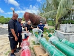 Lt. Jay DeInnocentiis meets with Marine Transportation leadership and ATON technicians to discuss the fixed and floating ATON constellation in Palau on May 14, 2024. The team completed a vital weeklong mission in the Republic of Palau, setting the stage for future collaboration and bolstering safe maritime navigation and security. This visit, in response to a request from Palau Marine Transportation, focused on an Aids to Navigation (ATON) Subject Matter Expert Exchange (SMEE). (U.S. Coast Guard photo)