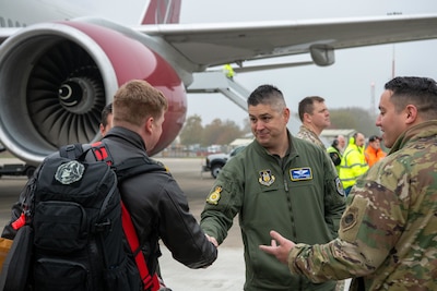 Airmen shake hands