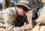 U.S. Army 1st Lt. Joe Gardner, a platoon leader assigned to the 303rd Ordnance Battalion (EOD), 8th Military Police Brigade, 8th Theater Sustainment Command, installs a .50-caliber rocket wrench to a simulated fuse of a simulated bomb during pre-deployment training before Operation Render Safe 2024 on Royal Australian Air Force Base Amberley, Australia, Aug. 21, 2024. Operation Render Safe 2024 is an Australian-led operation in Oceania to exchange explosive ordnance tactics, techniques, and procedures and reduce the risk of explosive remnants of war across the country of Solomon Islands. (U.S. Army photo by Staff Sgt. Tristan Moore)