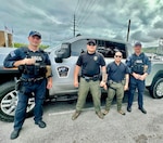 Maritime Safety and Security Team (MSST) Honolulu, stand with Department of Agriculture Guam Conservation Officers during a Ports, Waterways, and Coastal Security (PWCS) mission in Guam from Aug. 31 – Sept. 18, 2024. During this period, MSST Honolulu, augmented by MSST San Francisco, provided a law enforcement (LE) capable tactical crew to bolster regional security efforts. (U.S. Coast Guard photo)