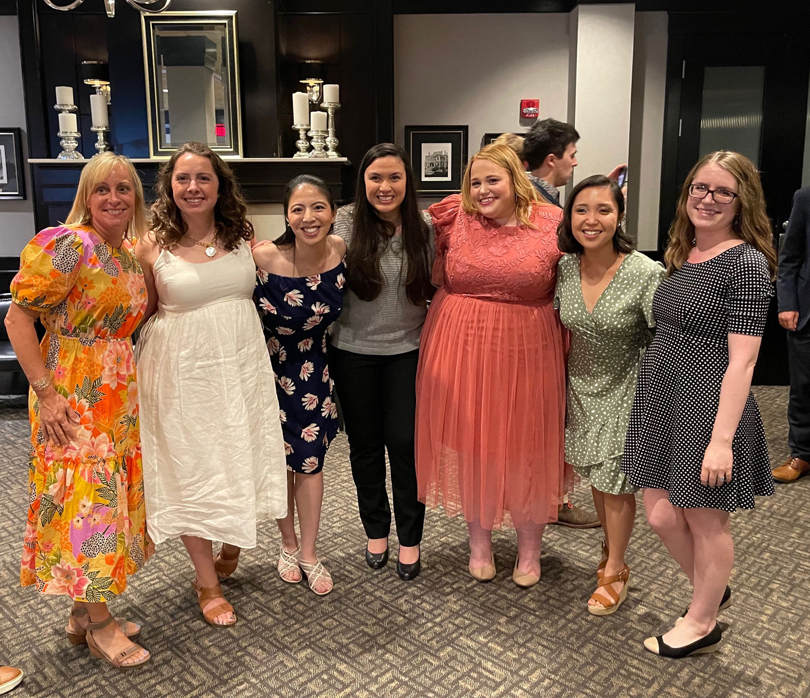 Photo of Women's health seniors and attendings celebrating graduation.