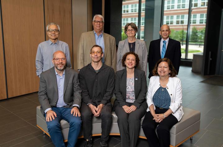 Consortium members sitting together.