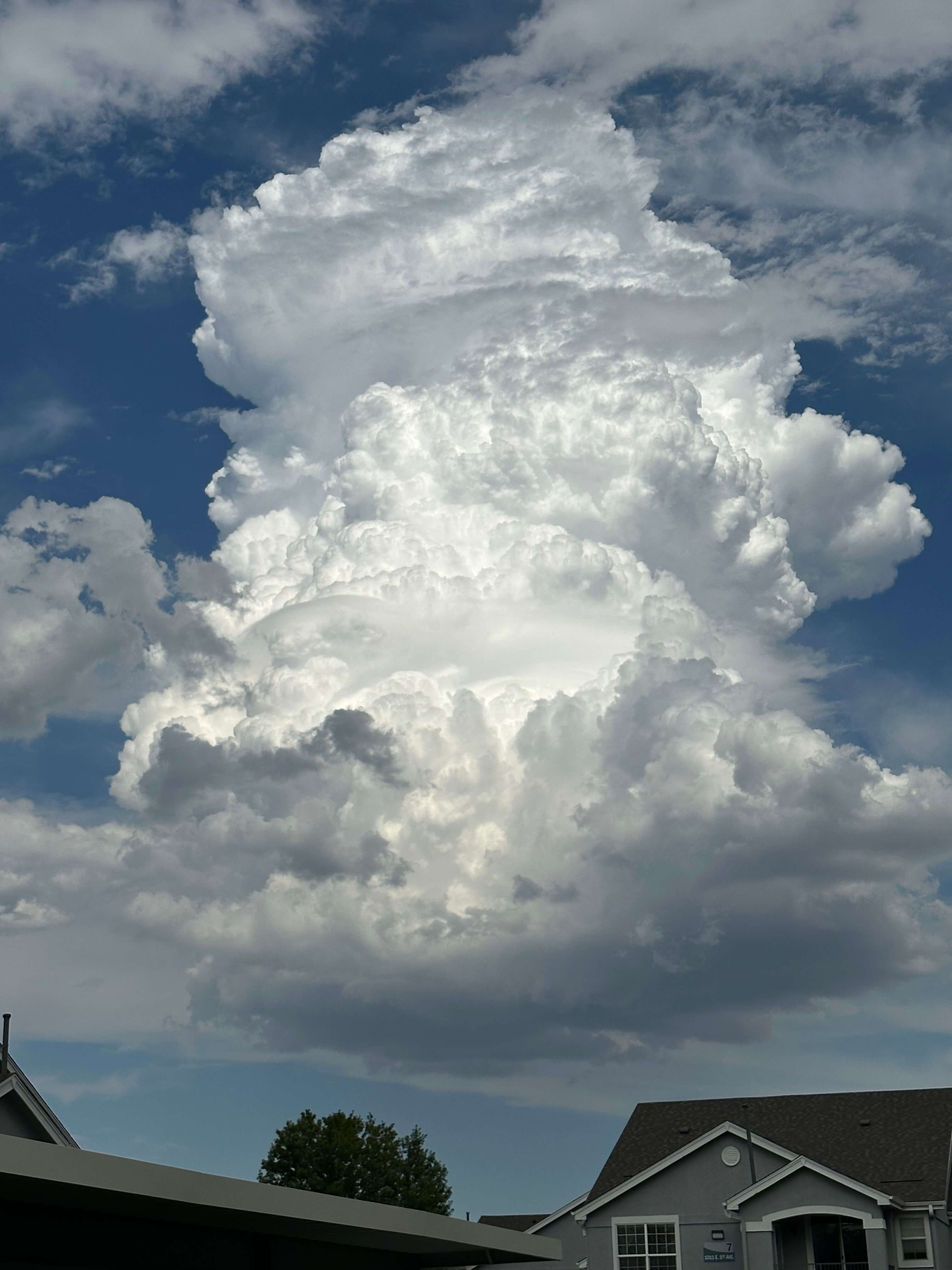 Very tall pillowing cloud in the sky