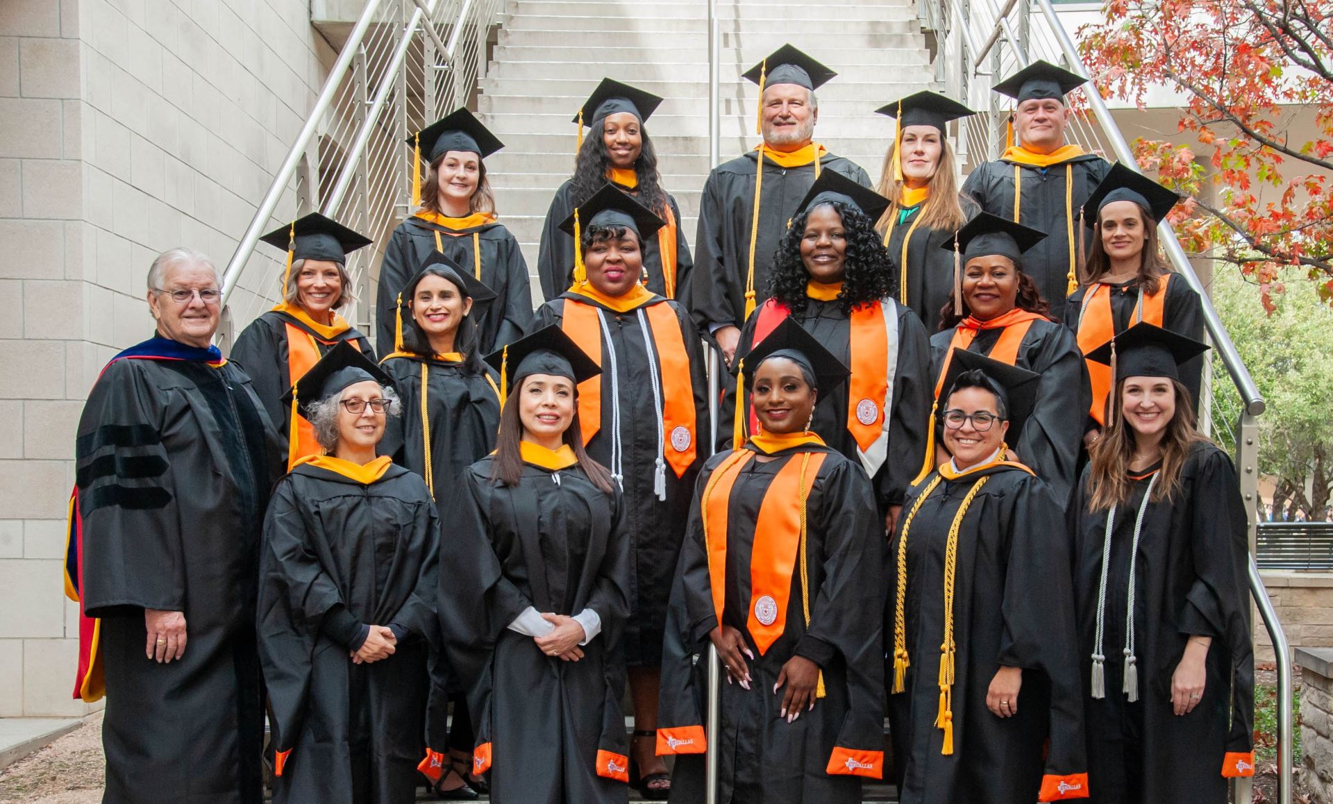 graduates at commencement