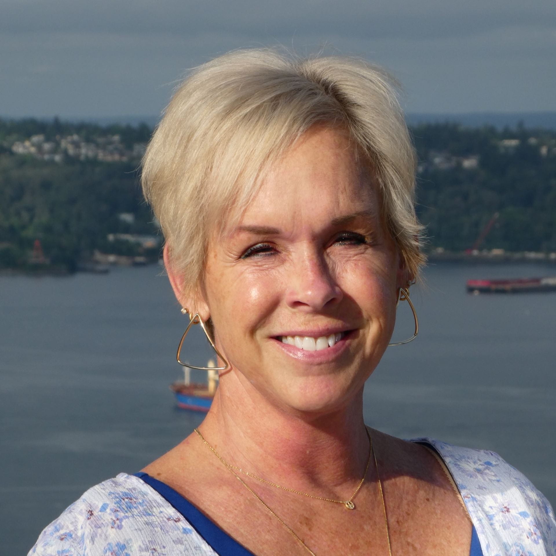 A woman smiling for a headshot