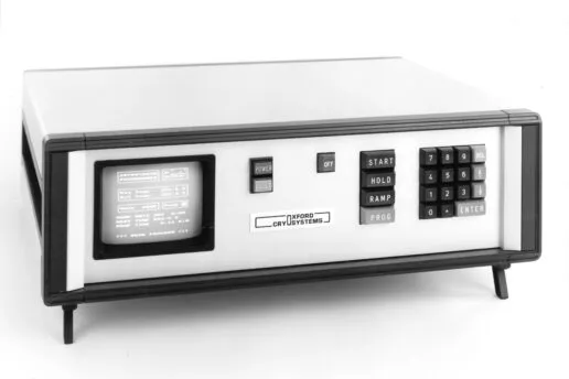 An original Cryostream controller from the 1980s, featuring a small CRT display and a large physical number pad for setting temperature.