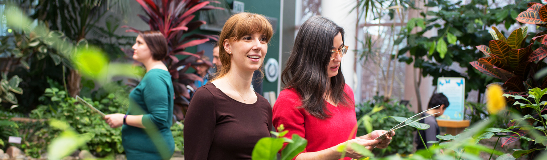 Two women in the butterfly house