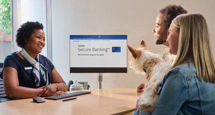 A couple speaks with a banker about Secure Banking at their local Chase branch