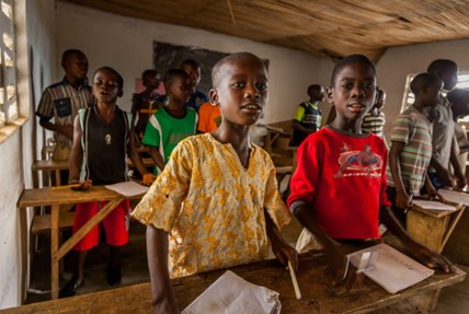 Photo of young students in a classroom