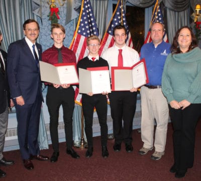 Lifeguards receiving their Red Cross lifesaving award.